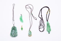 FIVE JADE PENDANTS