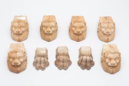 A GROUP OF ITALIAN TERRACOTTA LION HEAD AND FEET POT STANDS