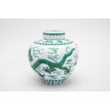 AN UNDERGLAZE BLUE AND GREEN ENAMELLED DRAGON JAR AND COVER