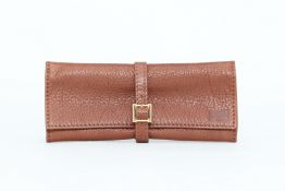 A BURBERRY BUCKLE BOUND FOLDING LEATHER WALLET