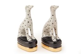 A PAIR OF INDIA JANE STAFFORDSHIRE STYLE DALMATIONS