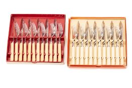 TWO SETS OF SIX FISH KNIVES AND FORKS