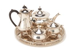 A SILVER PLATED FOUR PIECE TEA SERVICE WITH TRAY