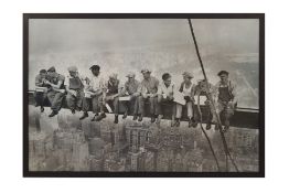 A FRAMED PRINT OF 'LUNCH ATOP A SKYSCRAPER'