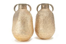 A PAIR OF WHITE METAL URNS