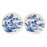 A PAIR OF JAPANESE BLUE AND WHITE PORCELAIN CHARGERS