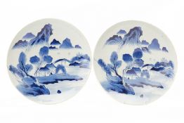 A PAIR OF JAPANESE BLUE AND WHITE PORCELAIN CHARGERS