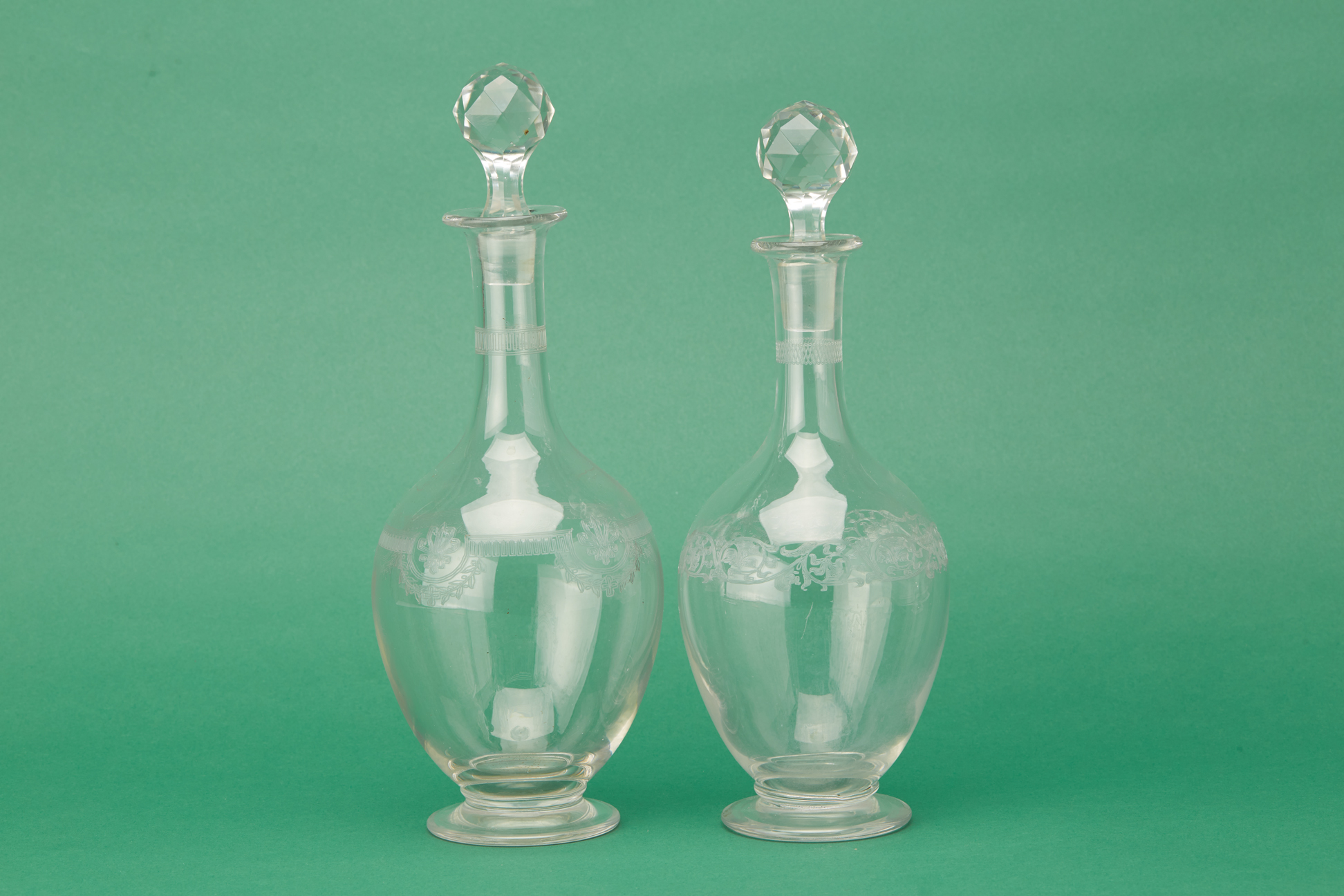 TWO FRENCH GLASS DECANTERS