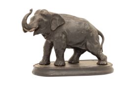 A CAST METAL MODEL OF AN ASIAN ELEPHANT