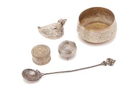 A GROUP OF WHITE METAL ITEMS