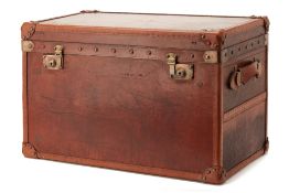 A LEATHER TRAVELLING TRUNK