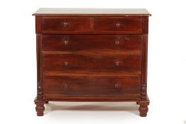 A TEAK CHEST OF DRAWERS