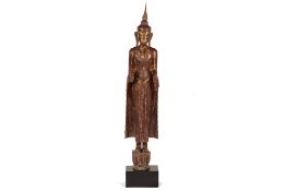 A BURMESE LACQUERED WOOD STANDING BUDDHA