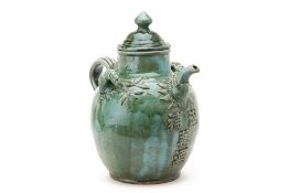 A LARGE CHINESE GREEN GLAZED HERBAL WINE POT