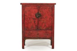A SMALL CHINESE RED LACQUERED CABINET