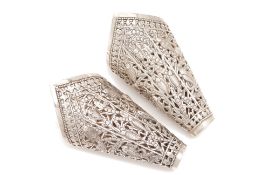 A PAIR OF CAMBODIAN SILVER BETEL LEAF HOLDERS