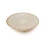 A WHITE GLAZED BOWL