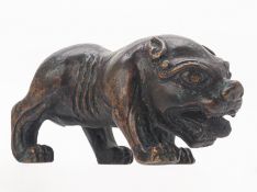 A CAST BRONZE MODEL OF A GUARDIAN LION