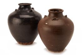 TWO BROWN GLAZED STORAGE JARS