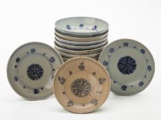 A LARGE GROUP OF SMALL BLUE AND WHITE FOLIATE DISHES