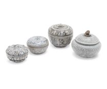 A GROUP OF FOUR SAWANKHALOK BOXES AND COVERS