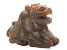 A CARVED JADE MODEL OF A MYTHICAL BEAST