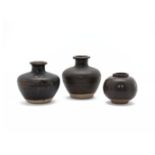 THREE SOUTHEAST ASIAN BROWN GLAZED JARS