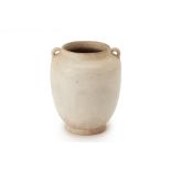 A WHITE GLAZED TWIN HANDLED STONEWARE JAR