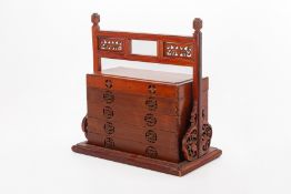 A CHINESE FOUR TIER WOOD BASKET