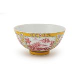 A YELLOW GROUND FAMILLE ROSE PORCELAIN BOWL