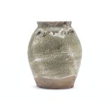 A GREEN GLAZED STORAGE JAR