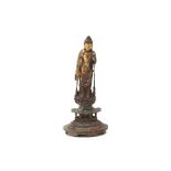 A GILT BRONZE STANDING BUDDHA FIGURE