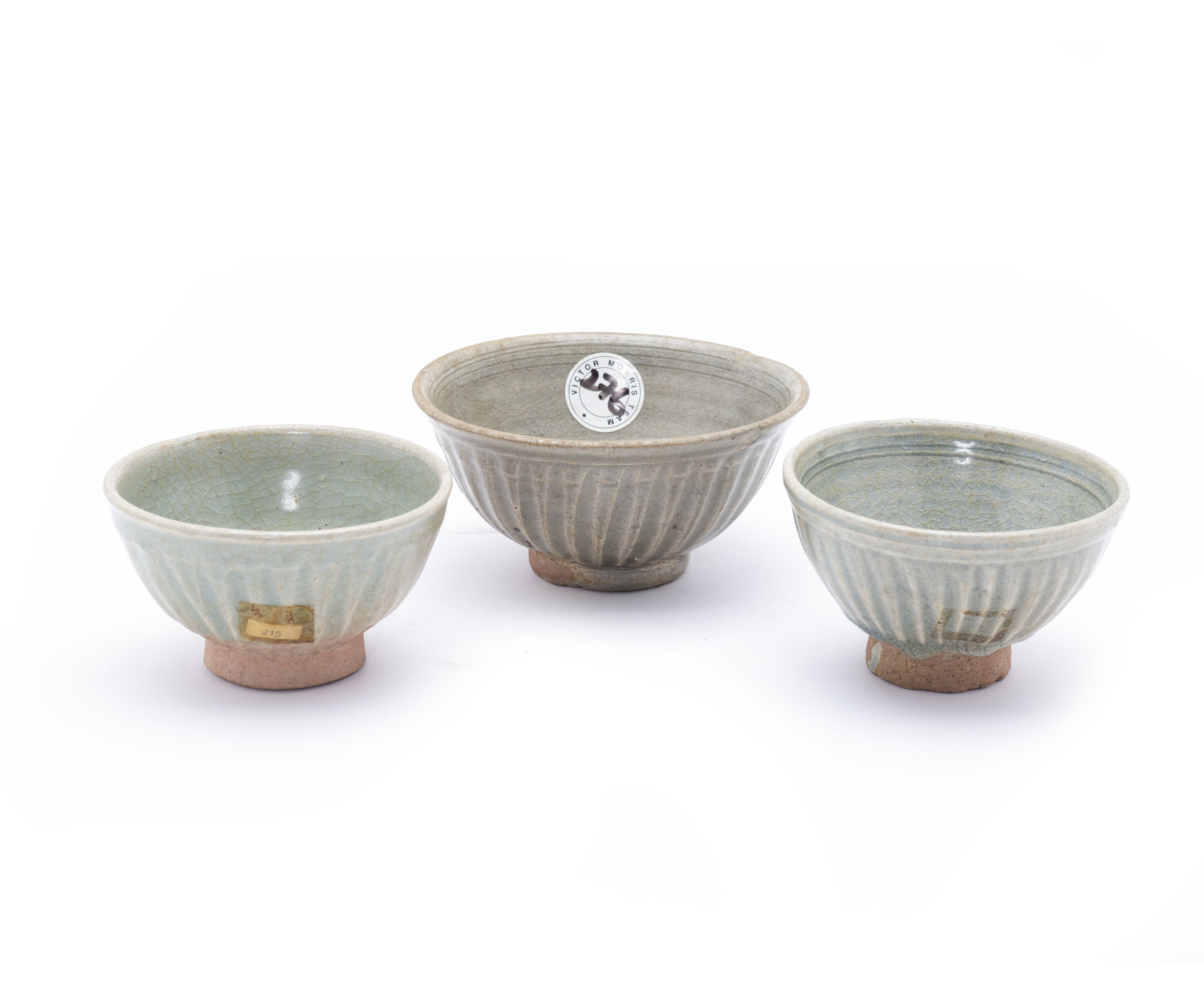 THREE THAI SAWANKHALOK CELADON GLAZED BOWLS