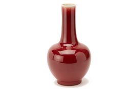 A SANG DE BOEUF BOTTLE VASE