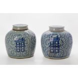 TWO SIMILAR BLUE AND WHITE GINGER JARS AND COVERS