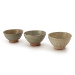 THREE CELADON GLAZED SMALL BOWLS