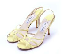 A PAIR OF JIMMY CHOO YELLOW HEELS EU 40.5