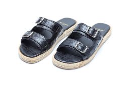 A PAIR OF SAINT LAURENT LEATHER SLIDES EU 36