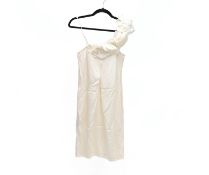 A CREAM COLOURED SILK EVENING DRESS