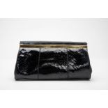 A ROMAN VINTAGE BLACK LEATHER CLUTCH