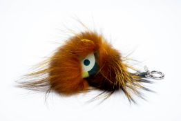 A FENDI BROWN FUR MONSTER BAG CHARM