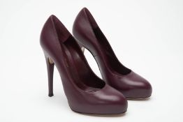 A PAIR OF GIANVITO ROSSI BURGUNDY LEATHER HEELS EU36
