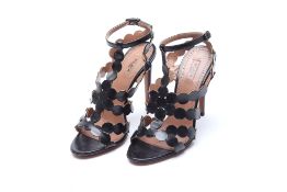 A PAIR OF ALAÏA HEELED STRAPPY SANDALS EU36