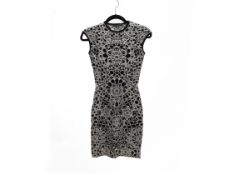 AN ALEXANDER MCQUEEN BLACK AND WHITE KNITTED DRESS