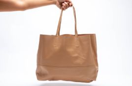 A BARNEYS NEW YORK LIGHT BROWN TOTE BAG