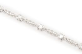 A WHITE GOLD AND DIAMOND BRACELET