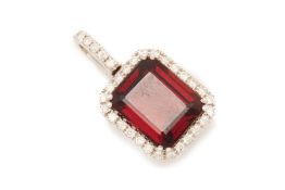 A GARNET AND DIAMOND PENDANT