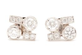 A PAIR OF DIAMOND STUD EARRINGS