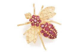 A GOLD AND RUBY BEE BROOCH