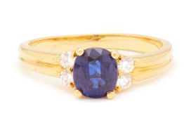 A SAPPHIRE AND DIAMOND RING